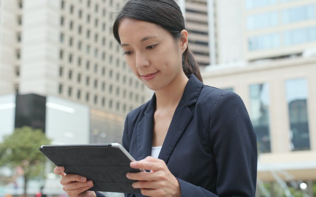 Businesswoman use of tablet computer at outdoor
